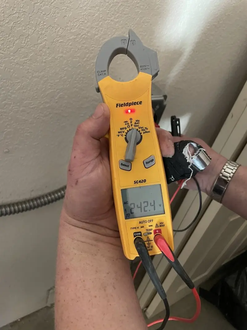 Voltage testing with clamp meter during Electrical Installation Services in Little River